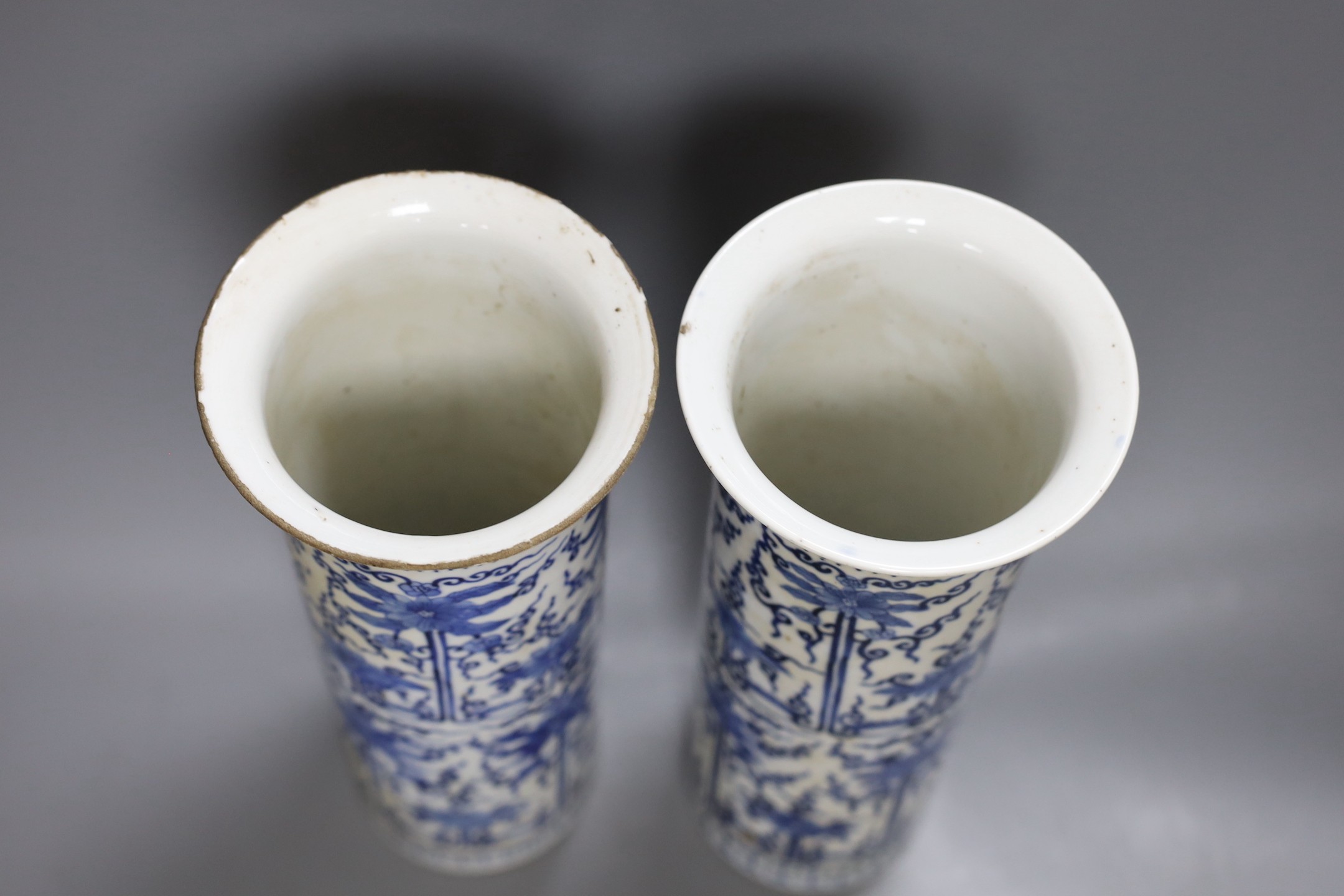 A pair of 19th century Chinese blue and white sleeve vases 30.5cm